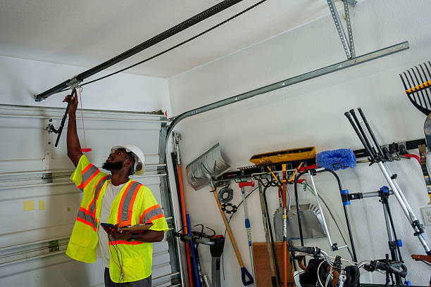 Professional Garage Door Panel Replacement technician working in Sheffield, OH